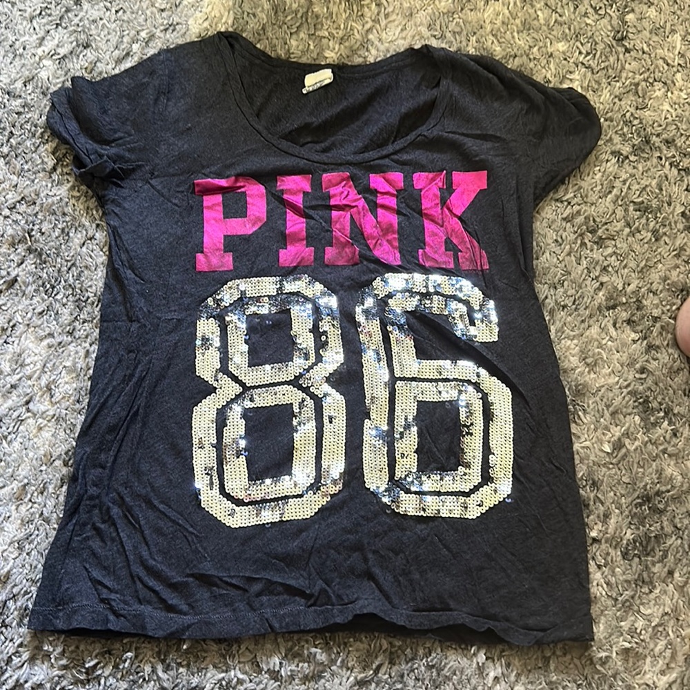 Woman’s pink shirt